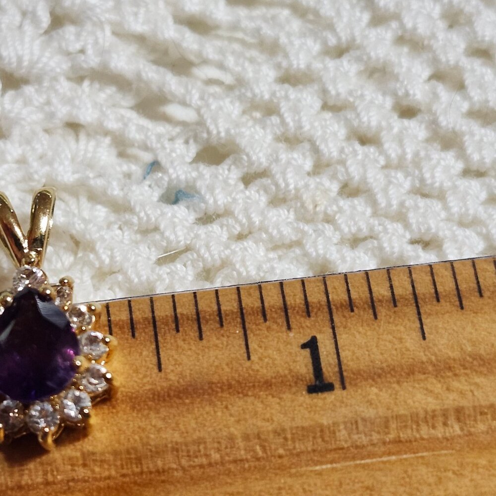 Silver with a good gold plate tear drop amethyst pendant
